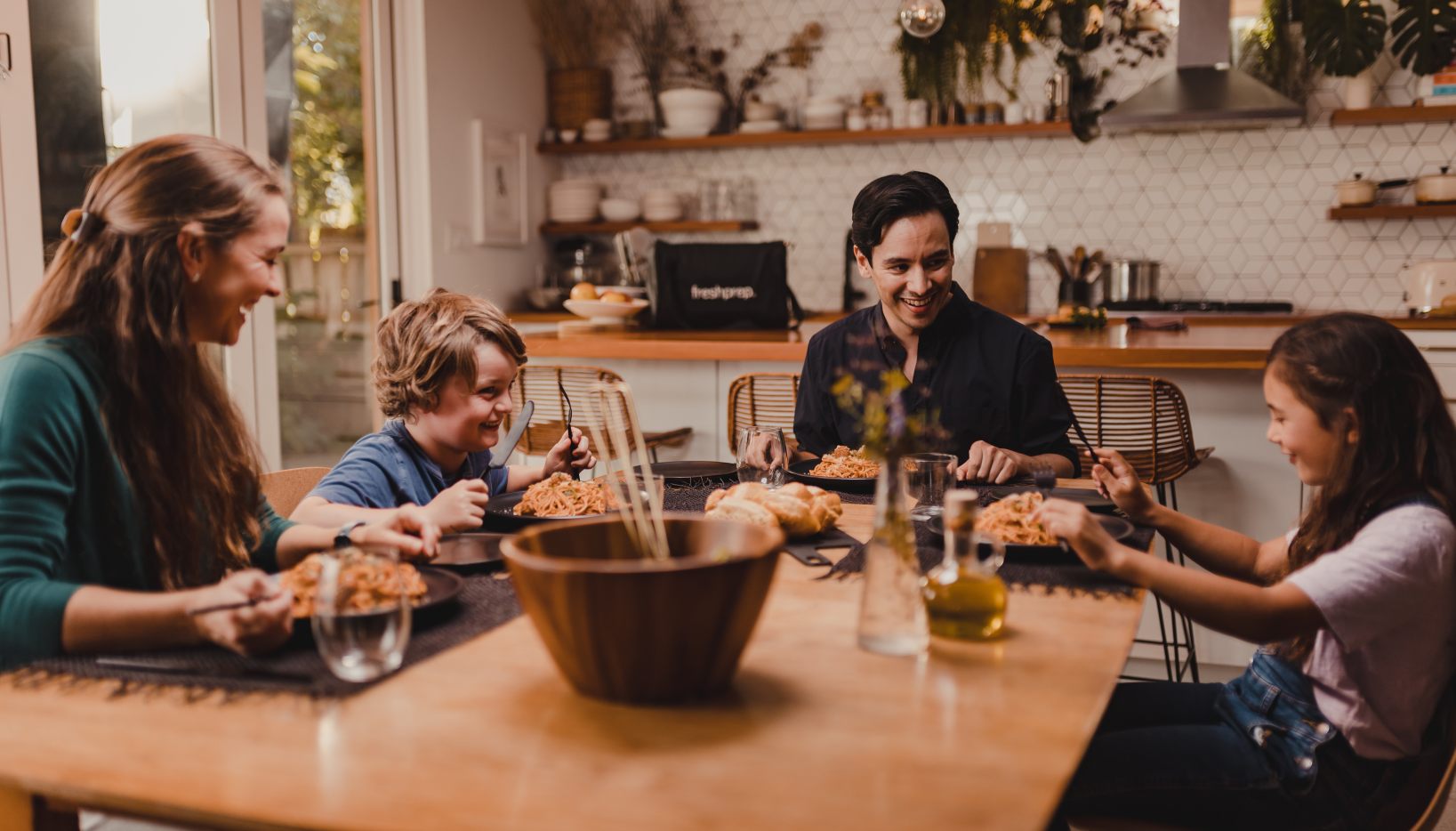 Family enjoying a home-cooked Fresh Prep meal